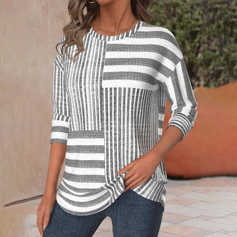Jacqueline | Blusa listrada em tecido respirável
